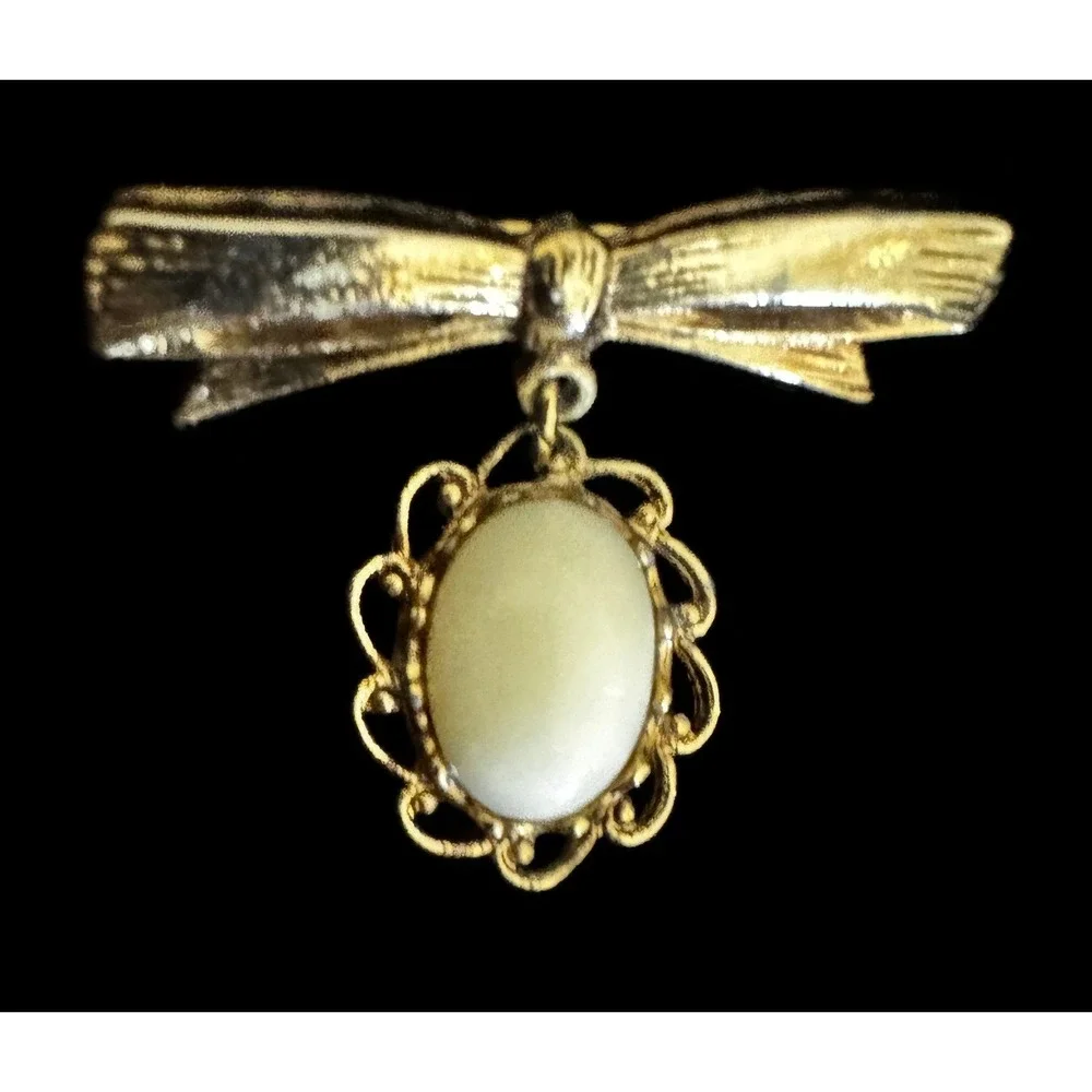 Vintage Gold Tone Bow Brooch White Oval Cabochon Dangle Scalloped Filigree Pin